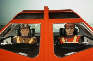 Captain Scarlet doesn't like it when someone fiddles with his radio stations when he's driving.
